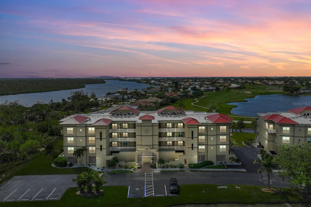 Photo of 10055 Links Lane #206, Rotonda West, FL 33947 (MLS # D6144106)