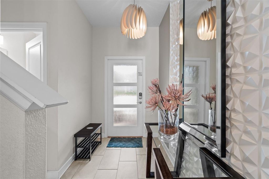 Photo of 590 Pebble Beach Drive, Davenport, FL 33896 (MLS # O6343332)