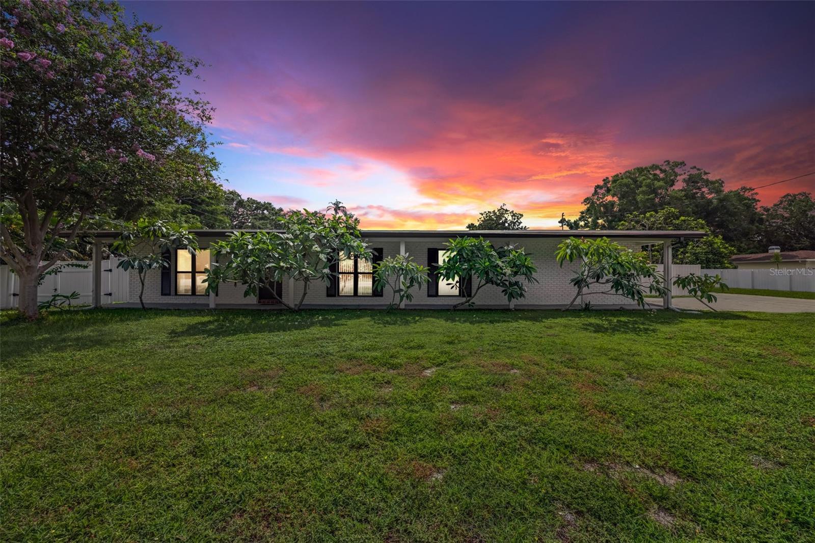 Priced below appraised value. Motivated seller. Central Clearwater 4 bedroom family home zoned for the popular Plumb/ Oak Grove/ Clearwater High Schools. Fabulous Mid Century Modern design with a skylight and pitched ceilings. This home is in beautiful condition featuring an updated kitchen with lovely neutral wood shaker style cabinetry and granite counters. Eat in kitchen for anyone to host family and friends with generous cabinet space and three ovens. Large breakfast bar open to the living area. The Master bath was recently fully updated with grey vanity and subway tile walls. All windows are newer Common rooms are spacious and the floorplan allows for flexibility of space. Corner lot, with the driveway/ garage on a side street, Large yard allows for easy boat storage if needed. There are removable hurricane strength reinforcement beams for the garage door should a storm approach and the garage has ample space and storage. A large back porch is roofed, and can be finished easily as a screened room, or enclosed for extra living area (allowing for an additional 300+ sq ft). Located at almost the mid-point of Pinellas County, Clearwater Beach, Tampa or St Pete are all easily accessible. Ask about a possible