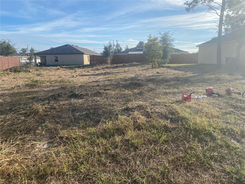 Photo of 308 Hibiscus Drive, Poinciana, FL 34759 (MLS # O6402695)