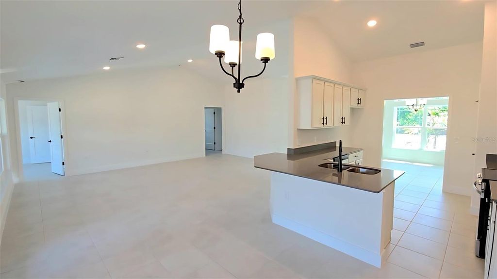 Photo of 4157 N Chamberlain Boulevard, North Port, FL 34286 (MLS # A4683629)