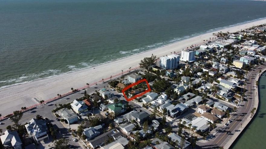 Build your dream home 100 feet from the sand on famed small town USA beach community of Pass A Grille Beach. The house next door on the beach is newer and one story, ensuring 2 floors of wide open Gulf views for a new build. This lot has been cleared and is a vacant land site.