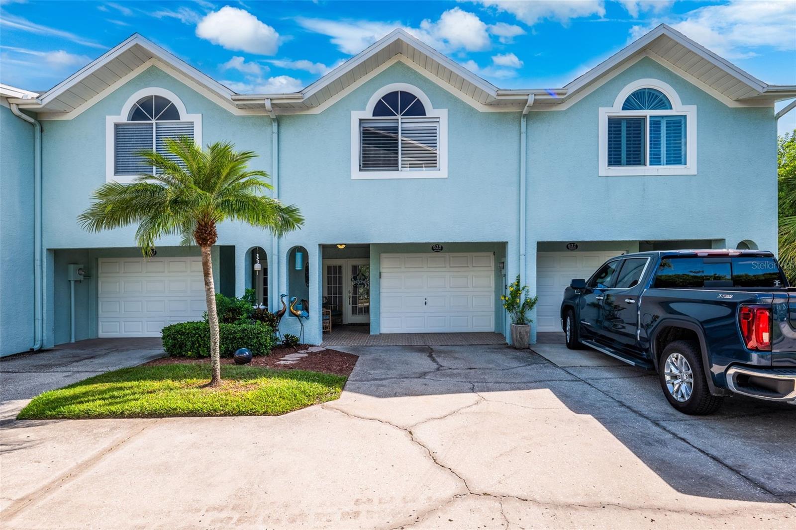 Short Sale. Discover your perfect waterfront escape in this beautifully remodeled townhouse on the Intracoastal Waterway, tucked away in a quiet setting just minutes from the shops, dining, and sandy shores of Indian Rocks Beach. The entire third floor is dedicated to the Primary Suite, featuring vaulted ceilings, a spacious closet, private deck, and sweeping water views, while a cozy ground-level office or bonus room with sliding doors provides flexible living space. Step outside and launch your kayak right from your back door or enjoy south-facing decks on all three levels that fill the home with natural light—perfect for morning coffee or evening cocktails. With no popcorn ceilings, fresh coastal finishes, and brand-new decks installed in 2025, the open and airy vibe shines throughout. This pet-friendly community offers a heated pool, spa, tennis and pickleball courts, plus a nearby dog park, combining resort-style amenities with a tranquil waterfront lifestyle. Whether you’re seeking a seasonal retreat or a year-round residence, this hidden gem has it all.