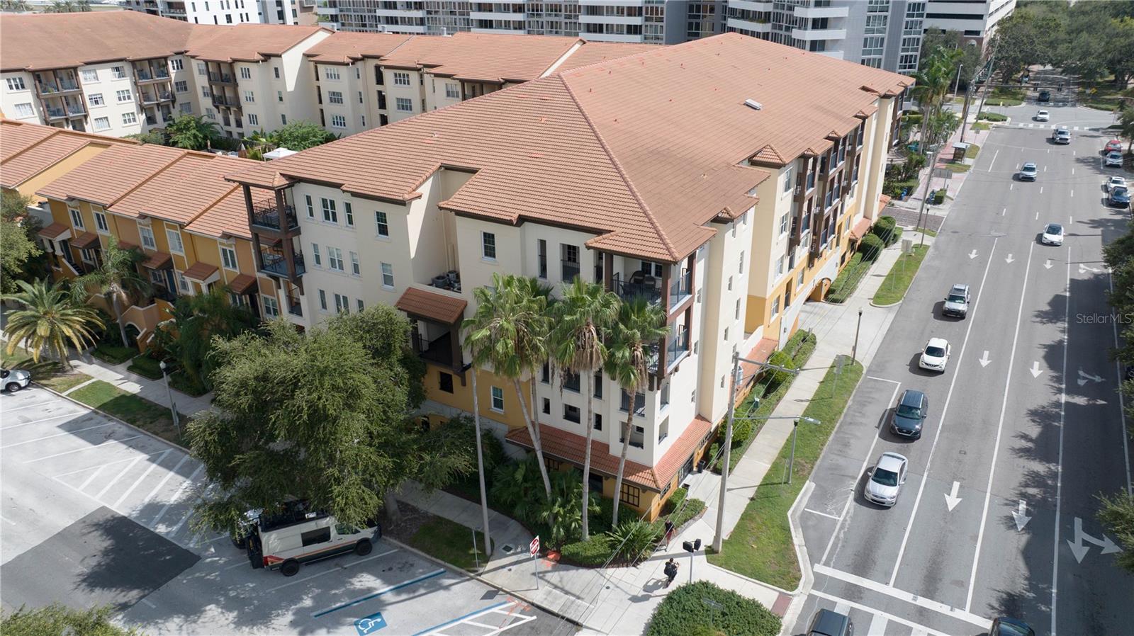 Experience the vibrant lifestyle of Downtown St. Pete in this beautifully remodeled 3-bedroom, 2-bath corner-unit condo at The Madison, just two blocks from the waterfront and steps from world-class dining, nightlife, art galleries, museums, and boutique shopping. This unique home stands out with impact/noise-canceling windows, hardwood floors, granite countertops, a fully equipped kitchen with dual oven and stainless steel appliances, slow-close cabinetry throughout, a walk-in master bedroom closet, and a convenient in-unit washer/dryer. Both bathrooms have been thoughtfully renovated with stunning tile work—one featuring a walk-in shower and the other a soaking tub. As a true corner unit with no shared walls, it offers unmatched privacy along with an extended private patio and one of the most convenient spots in the building—close to the hot tub and with direct street access. For peace of mind and convenience, the home includes two reserved parking spaces in the secured, gated garage. The Madison’s resort-style amenities feature a heated pool, cabanas, outdoor grills, and a state-of-the-art fitness center, all impeccably maintained. With milestone inspections complete, no outstanding assessments, and a pet-friendly community, this residence delivers the perfect balance of style, comfort, and convenience in one of Florida’s most dynamic downtowns. Come see why The Madison is one of Downtown St. Pete’s most sought-after communities—schedule your tour today.
