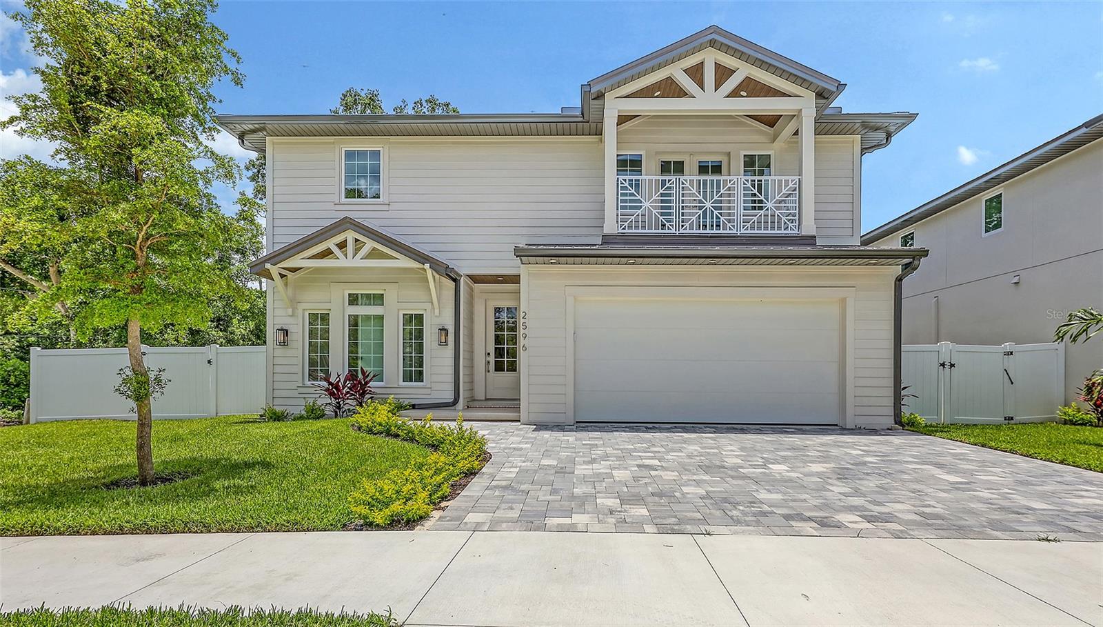 BRAND NEW 2025 – Luxe Living in Arlington Park This new construction home has a great vibe! Tucked away in Rustic Lodge, one of the most coveted corners of the Arlington Park neighborhood, is just minutes from the energy and charm of downtown Sarasota. Enjoy a private outdoor sanctuary designed for elevated living. The heated saltwater pool and spa offers a resort-style escape, while the fully equipped outdoor kitchen — featuring a premium Blaze grill, granite countertops, and a sleek Zephyr beverage center — makes al fresco entertaining effortless. Beautifully laid pavers define the sophisticated space, and a generous green area adds a touch of tranquility — perfect for a garden, a game of fetch, or just lounging in the sun. Inside, large-format porcelain tile flooring creates a sleek and modern tone, flowing from the stylish foyer into a light-filled, open-concept living space designed for both comfort and sophistication. At the heart of the home lies a show-stopping chef’s kitchen, where floor-to-ceiling Studio Luxe custom cabinetry, quartz countertops, a full-slab backsplash, and a bold waterfall island deliver both elegance and functionality. The high-performance Thermador appliance suite — including a 42” French door refrigerator, induction cooktop, wall oven combo, and sleek range hood — brings professional-grade style to everyday cooking. Bonus cabinetry just off the kitchen adds a pop of style and extra storage while an oversized pantry holds all of your culinary essentials and keeps life feeling tidy. The built-in mudroom connects to the two-car garage that features a durable epoxy-coated floor. This home features four spacious bedrooms, each with its own en-suite bathroom and custom walk-in closet designed for effortless organization. The primary suite is thoughtfully located on the first floor for ultimate privacy and convenience, offering a luxurious walk-in closet and a spa-inspired bathroom with dual vanities, an oversized walk-in shower, and a freestanding soaking tub — the perfect place to unwind in comfort. Upstairs, you’ll find a bonus room and a large sitting area, giving you all the space you need for lounging, movie marathons, or game nights. There’s also a dedicated storage room, ensuring everything has its place. Outdoor living is elevated with two beautiful balconies: a generous covered balcony along the entire width of the back of the home, and a quaint front-facing balcony on the second floor, ideal for quiet mornings or evening stargazing. Luxury details throughout include Kohler plumbing fixtures, Toto commodes, Daltile porcelain tile, Franklin Lighting, titanium pavers, premium PGT windows, PVC vinyl fencing, and a wind-resistant 5V crimp metal roof ready to take on the Florida elements in style. A 21-foot driveway, irrigation system, exterior lighting, and decorative shutters round out the curb appeal. Enjoy a one-year builder warranty, because in this home peace of mind pairs perfectly with luxury living. Located just minutes from downtown Sarasota, Siesta Key Beach, St. Armands Circle, Sarasota Memorial Hospital, Legacy Trail, and top-rated schools, this property offers unmatched convenience. Plus, being within city limits means it qualifies for use as a vacation rental — making it a perfect choice for full-time living, a luxury retreat, or an investment opportunity. This is more than just a home — it’s a thoughtfully crafted lifestyle. Schedule your private tour today.
