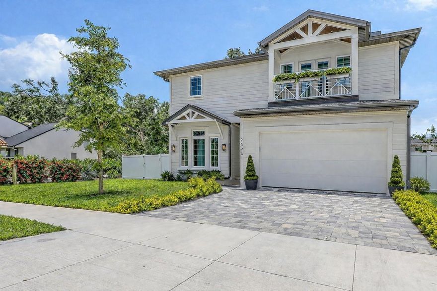 One or more photo(s) has been virtually staged. BRAND NEW 2025 – This 4 Bedroom + Bonus Room & Upstairs Loft Area has 5 Bathrooms and the Primary Bedroom on the First Floor.  Tucked away in Rustic Lodge, one of the most coveted corners of Arlington Park neighborhood, is just minutes from the energy & charm of downtown Sarasota. Enjoy a private outdoor sanctuary designed for elevated living. The heated saltwater pool and spa offers a resort-style escape, while the fully equipped outdoor kitchen — featuring a premium Blaze grill, granite countertops, and a sleek Zephyr beverage center — makes al fresco entertaining effortless. Beautifully laid pavers define the sophisticated space, and a generous green area adds a touch of tranquility — perfect for a garden, a game of fetch, or just lounging in the sun. Inside, large-format porcelain tile flooring flows from the stylish foyer into a light-filled, open-concept living space designed for both comfort and sophistication. At the heart of the home lies a show-stopping chef’s kitchen, where floor-to-ceiling Studio Luxe custom cabinetry, quartz countertops, a full-slab backsplash, and a bold waterfall island deliver both elegance and functionality. The high-performance Thermador appliance suite — including a 42” French door refrigerator, induction cooktop, wall oven combo, and sleek range hood — brings professional-grade style to everyday cooking. Bonus cabinetry just off the kitchen adds extra storage while an oversized pantry holds all of your culinary essentials. This home features four spacious bedrooms, each with its own ensuite bathroom and custom walk-in closet designed for effortless organization. The primary suite is thoughtfully located on the first floor for ultimate privacy and convenience, offering a luxurious walk-in closet and a spa-inspired bathroom with dual vanities, an oversized walk-in shower, and a freestanding soaking tub. Upstairs, you’ll find a bonus room and a large sitting area, giving you all the space you need for lounging, movie marathons, or game nights. Outdoor living is elevated with two beautiful second floor balconies: a generous covered balcony along the entire width of the back of the home, and a quaint front-facing balcony, ideal for quiet mornings or evening stargazing. Luxury details throughout include Kohler plumbing fixtures, Daltile porcelain tile, Franklin Lighting, titanium pavers, premium PGT windows, PVC vinyl fencing, and a wind-resistant 5V crimp metal roof. A 21-foot driveway, irrigation system, exterior lighting, and decorative shutters round out the curb appeal. Enjoy a one-year builder warranty. Located just minutes from downtown Sarasota, Siesta Key Beach, St. Armand's Circle, Sarasota Memorial Hospital, Legacy Trail, and top-rated schools, this property offers unmatched convenience. This is more than just a home — it’s a thoughtfully crafted lifestyle.