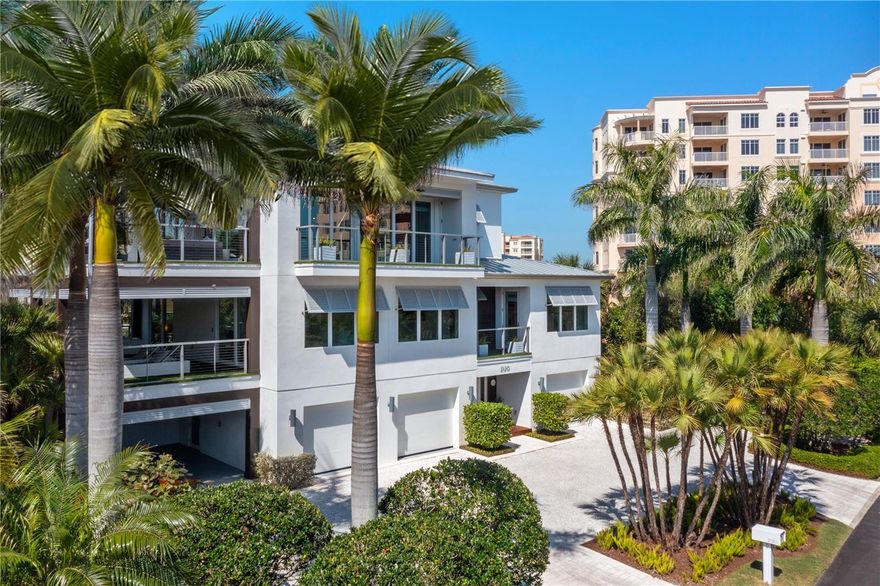 3 Story Ocean View, 5 bed/4.5 bath, luxury coastal contemporary home with elevator on secluded oversized lot across from ocean at end of dead-end street that abuts Minorca. One of only few houses on the street that have grandfathered rights to enjoy all of the amenities at Minorca and Inlet Villas Marina. All bedrooms and living areas transition through large glass sliding doors to huge, covered porches for seamless and luxurious open indoor/outdoor living on all floors. This West Indies inspired luxury coastal home was built in 2019 by Rex Tibbs and landscaped by Signature Landscape, both of Winter Park, FL, and boasts 3596 SF in living space under air, 1976 SF in covered porches and balconies, and 1191 SF for 3 car garage plus carport, summer kitchen, pool/spa, and large backyard. 3rd floor has open kitchen and family room with natural gas Wolfe and Subzero appliances, two islands, fireplace, wet bar, office, powder bath, and two enormous porches to maximize the gorgeous ocean views and breezes. 2nd floor has 3 bedrooms/3 bath (incl. master bedroom w/walk-in closet, in-suite soaking tub, separate shower and double vanity), plus Miele coffee bar and lounge all of which open onto balconies. 1st floor includes guest bedroom with French doors, living/pool room with bath, disappearing sliding glass doors for indoor/outdoor transition to summer kitchen, pool/spa deck, and back yard. Gorgeous, covered summer kitchen and large entertainment area opens to heated saltwater pool and spa with IPE wood pool deck and gas fire table. Luxury pet-friendly, draining turf system on all 5 upper floor balconies and porches. Smart house for lighting, security cameras, pool, and indoor/outdoor sound system. Gas Generator. 1st and 2nd floor laundry rooms. 2 natural gas water heaters. 3 car garage plus separate carport with wall hanging storage system. Minorca amenities includes clubhouse, fitness, pools, cabana, tennis courts, fishing pier, and private marina with boat slips for rent and purchase