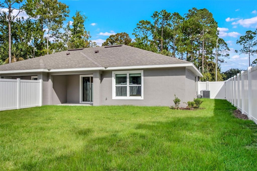 Photo of 91 Brunswick Lane, Palm Coast, FL 32137 (MLS # FC313349)