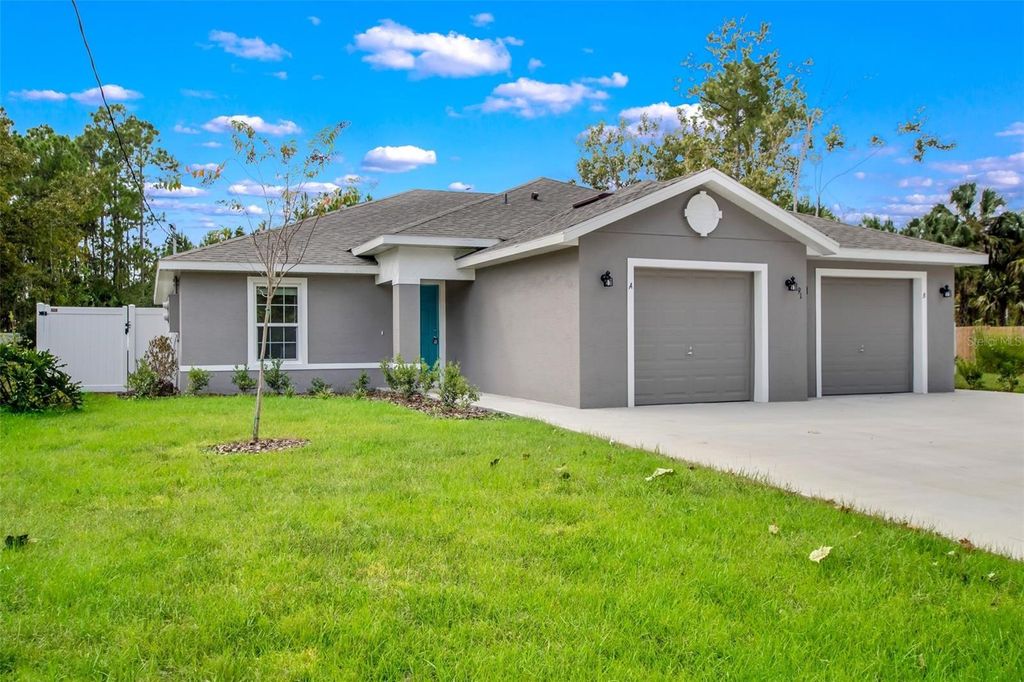 Photo of 91 Brunswick Lane, Palm Coast, FL 32137 (MLS # FC313349)