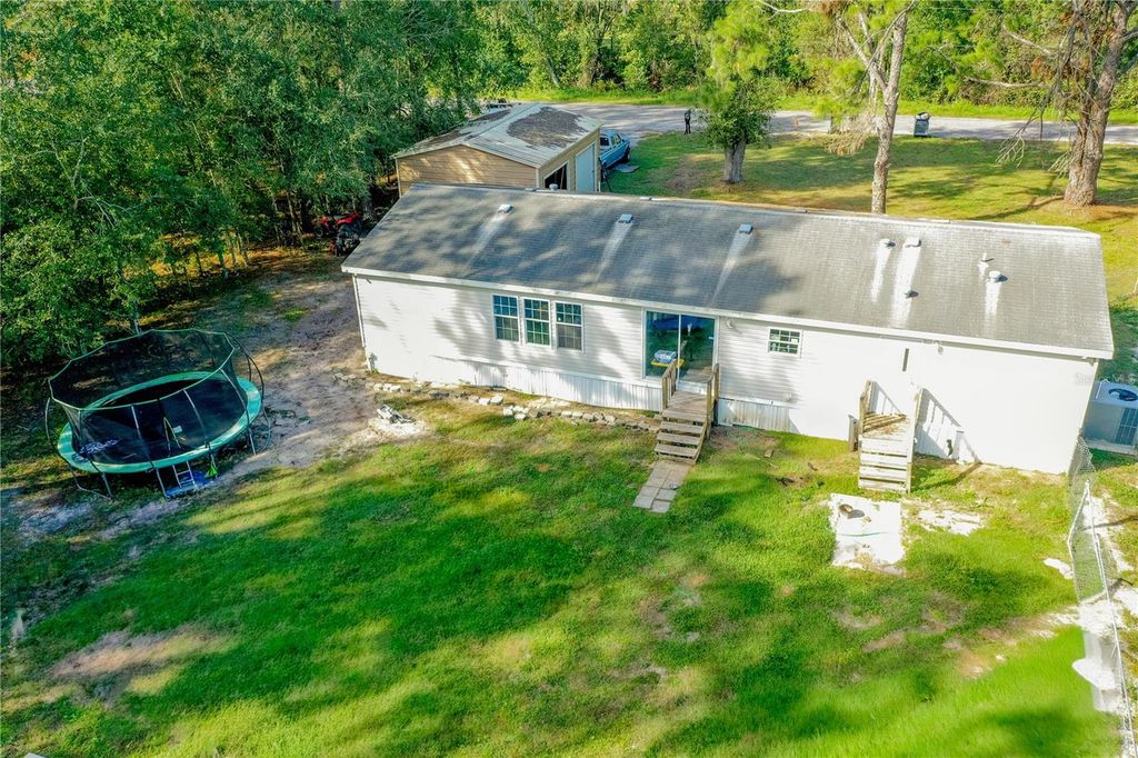 Photo of 14911 Melody Ln, Polk City, FL 33868 (MLS # P4936979)