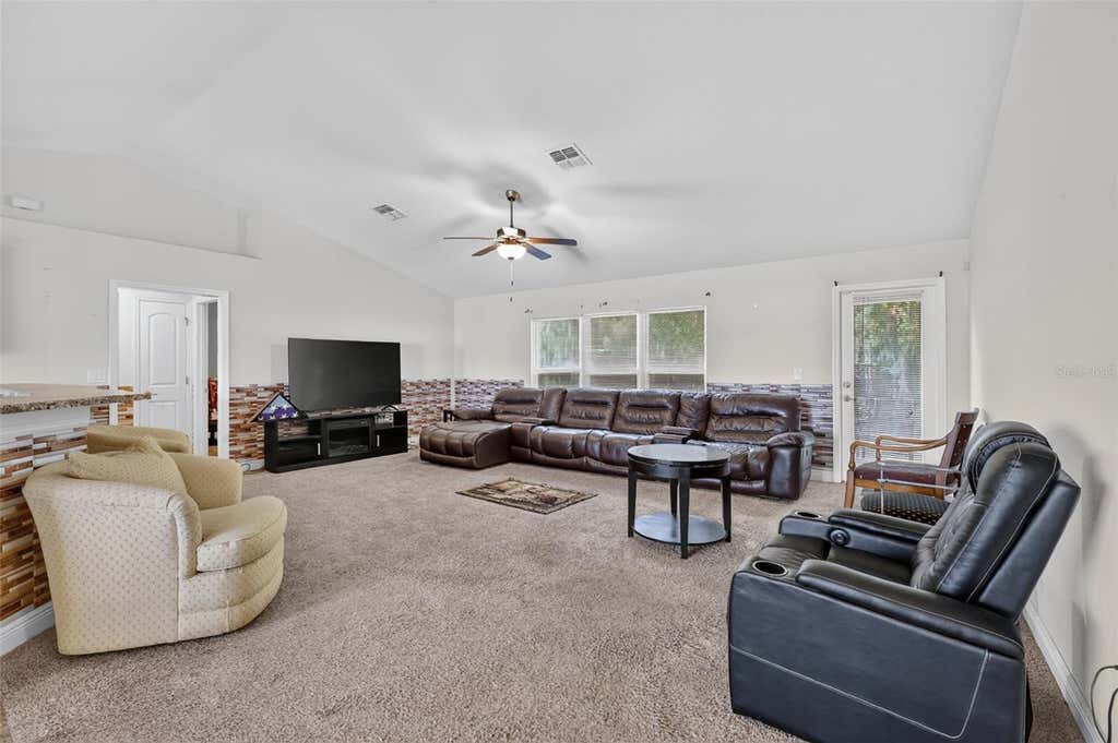 Photo of 702 Chelsea Avenue, Fruitland Park, FL 34731 (MLS # O6429925)