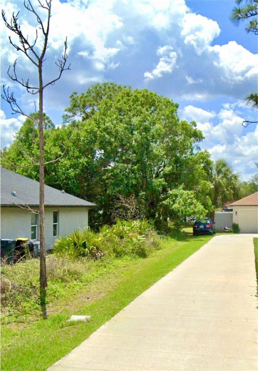 Nice Flag Lot in Neighborhood 3, Village 3, nearly a quarter of an acre in desirable area of Poinciana. Home values in the $300,000.+ price range.  Polk County side.  Will require Flood Insurance.