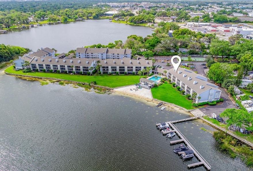 Gorgeous third floor condo with spectacular views! This RENOVATED 2-bedroom, 2
bath unit in the desirable Fairview Vista community offers direct frontage on LAKE FAIRVIEW and PANORAMIC WATER VIEWS from your private
SCREENED BALCONY. Located on the top floor (WITH ELEVATOR ACCESS), this light filled layout features vaulted ceilings and floor to ceiling
windows that bring the outside in. Major updates have already been completed, so all you need to do is move in and enjoy! The entire interior
was FRESHLY PAINTED IN (2024), with new attic fiberglass insulation added for energy efficiency. The A/C WAS REPLACED IN (2020), the
ELECTRICAL PANEL UPGRADED IN (2022), and the ROOF on the building was replaced in (2021). Inside you will appreciate the sleek and timeless
finishes: white cabinetry topped with crown molding, a subway tile backsplash, must have STAINLESS STEEL APPLIANCES, elegant countertops,
and a breakfast bar perfect for casual meals or entertaining. The kitchen and both bathrooms were stylishly remodeled in (2020), and durable
WOOD LOOK TILE FLOORING was installed throughout that same year. The living room features a chic WOOD BURNING FIREPLACE and opens to
the spacious screened balcony overlooking the pool, sand beach and lake – the ideal spot to relax and unwind or entertain with a sunset
backdrop. The PRIMARY SUITE also enjoys direct WATER VIEWS, while the SPLIT BEDROOM floor plan provides privacy for guests or a home
office. Additional perks include a new front screen door (2024), IN-UNIT LAUNDRY with extra storage, a covered front entry, and your own
covered parking space just steps from the elevator. Fairview Vista is a friendly, well-kept, small waterfront community offering resort-style
amenities: a lakeside pool and spa, tennis courts, a sandy beach, covered seating, and a boat dock with ramp and parking. With direct lake
access and boat slips available, it is a rare opportunity for lakefront living in the heart of Orlando. Tucked away just off 441, you are also just
minutes from College Park’s shops and dining, and have quick access to all that Central Florida has to offer. Whether you are looking for full-time,
seasonal, or low-maintenance living with breathtaking views – this one checks all the boxes. Welcome to the lakefront lifestyle you’ve been
waiting for - call today to schedule a tour!