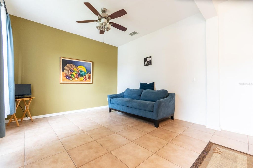 Photo of 7908 Bear Claw Run, Orlando, FL 32825 (MLS # O6451900)