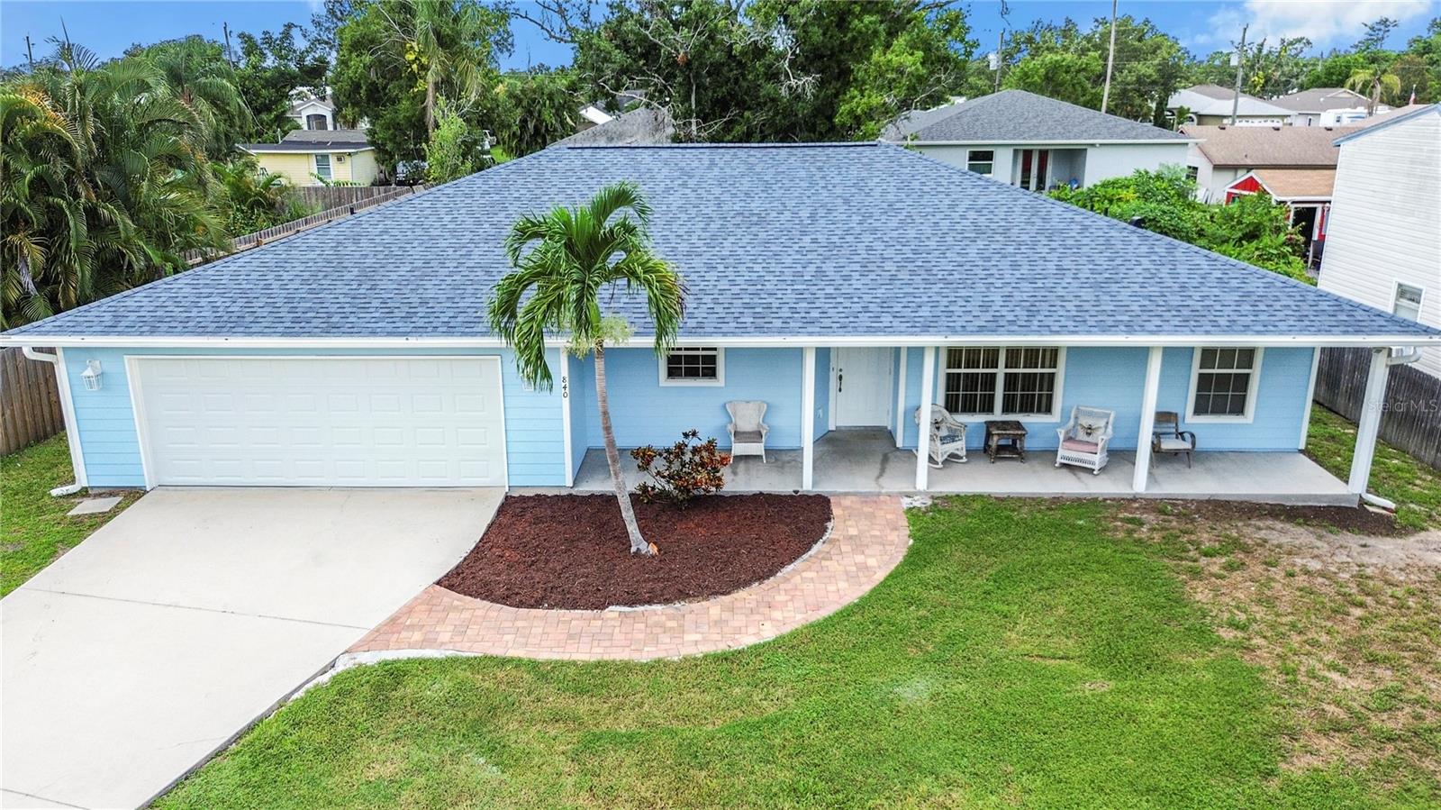 One or more photo(s) has been virtually staged. Here is a 3 bedroom 2 bathroom single-family home that checks all the boxes. This home features insurance friendly features including a New Hip Roof and Impact Windows and Sliding Glass Door. Other notable features and recent updates include: No HOA/Deed Restrictions, fresh paint inside and out, front gutter, newer poured driveway, stainless steel appliances, granite counters throughout including kitchen island, bar top & bathrooms, lots-of kitchen cabinets, newer plumbing fixtures, oversized garage (23’x25’), large attic space/room for extra storage, fenced-in back yard, great school zone, no water or septic bills, aerobic treatment unit septic, Underground power line to house, no carpet, dead-end street and covered front porch and rear patio. This is a great location as this home is close to everything one would need within a 1-mile radius including a public transportation hub, retail and multiple grocery stores, restaurants and I-75. The home is also only a short drive to Siesta Key and Lido Key beaches, downtown Sarasota, the Mall at UTC, tons of high-quality Restaurants, golf courses, the celery field walking trails and many county parks and playgrounds. This home could qualify for 100% financing as well as downpayment and closing cost assistance for qualified buyers. Inquire for more details. Come see this home before it is gone!