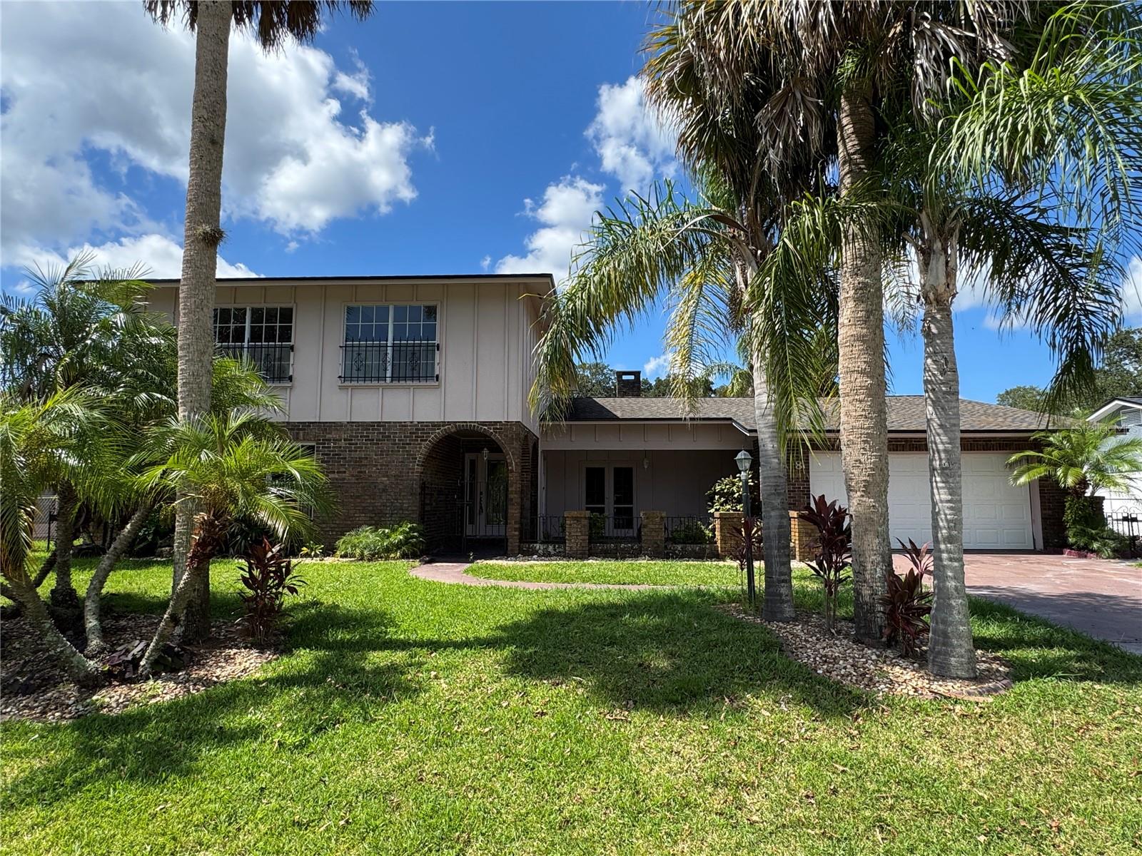 CALLING ALL INVESTORS! Spacious 4-bedroom home on a saltwater canal, featuring two primary suites (one upstairs and one down), 3.5 baths, and a cozy brick fireplace. Just a quick boat ride to the Intracoastal Waterway! This property offers endless potential—bring your vision to restore its former beauty. Motivated sellers—schedule your showing today and make an offer!