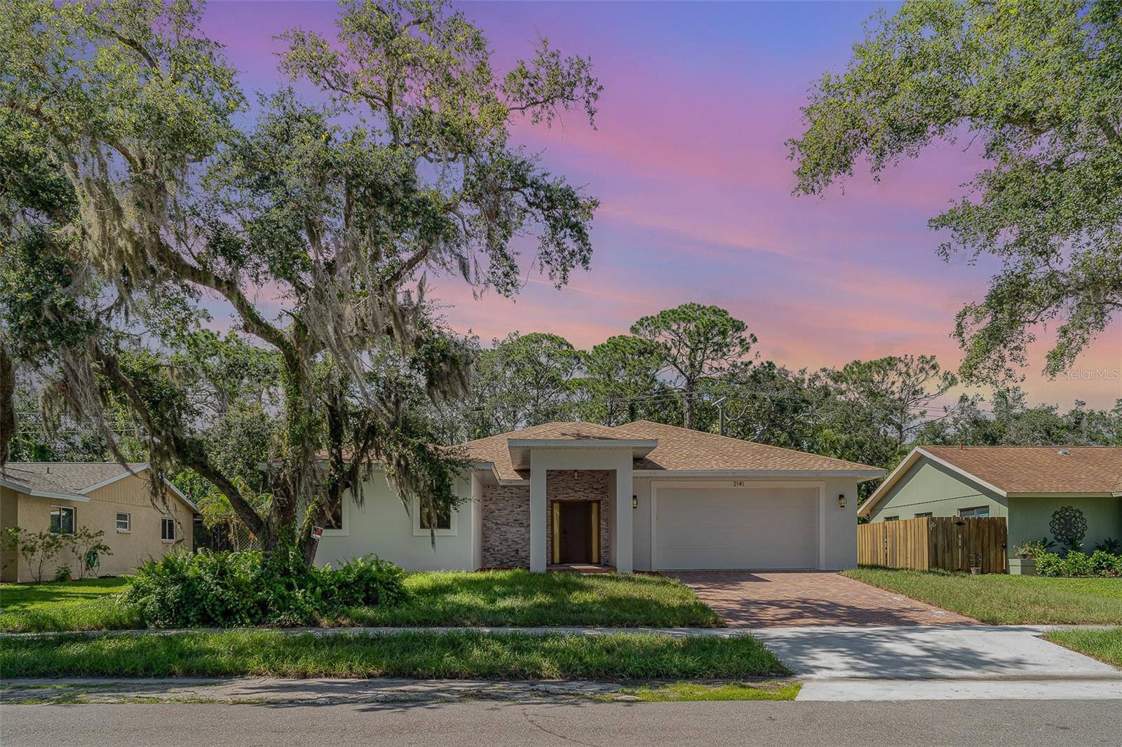 One or more photo(s) has been virtually staged. Be the first to own this beautiful new construction home in the desirable Colonial Oaks neighborhood! Low HOA, no CDD! MOTIVATED Sellers!
This 3-bedroom, 3-bath custom residence offers modern design, high-end finishes, and flexible living space -including a formal dining room that can easily convert into a 4th bedroom, den, office or family room and lots of storage space throughout the home. Thoughtfully designed with quality craftsmanship and contemporary finishes and with 9.5" ceilings the home offers a spacious and inviting layout filled with natural light and unique lightning system, thanks to hurricane impact windows and sliding doors and the 21" elevation this home is built to be energy efficient and safe. Luxury vinyl plank flooring flows throughout the home, with stylish porcelain tile in the bathrooms. The spacious living area features a custom built-in entertainment center and plenty of room for dining and entertaining. The double-car garage includes an EV charger and extra space for bikes, kayaks, and storage. In the back the huge covered patio provides ample space to entertain and still there is plenty of room for a spa or a built in outdoor kitchen, the easement behind home gives you with extra privacy. Prepared pool/spa electrical in position in case if you choose to upgrade your backyard oasis, while in the front the setback provides enough space for trailer, RV, or additional vehicles.
Ideally located just a short drive from the beaches and downtown, surrounded by top-rated schools, great restaurants and offers easy access to I-75.Just around the corner, Colonial Oaks Park offers 23 acres of lush green space, complete with picnic areas, a playground, tennis and pickleball courts, basketball, and a vibrant activity center. This home truly offers the ideal blend of comfort, convenience, and community living.
There’s still time to select your finishes and make it your own! Schedule your private tour today before this opportunity slips away!
*Please note: Finishes are subject to change based on availability. Changes may be made by the builder or owner.