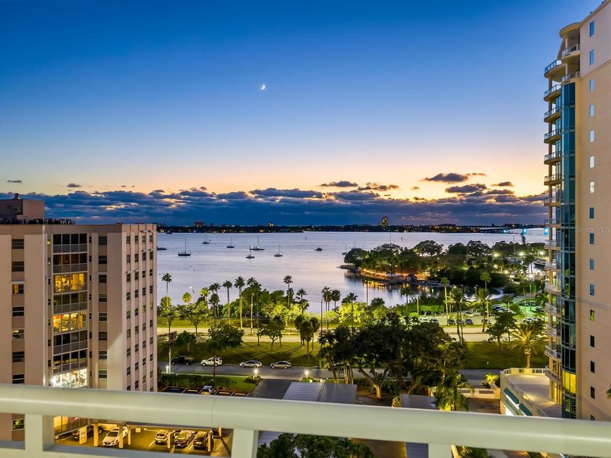 Spacious luxury on picturesque Palm Avenue. This Savoy condominium is one of only 24 residences in a Downtown building renowned for its beautiful location and exceptional standard of living. The Savoy offers remarkable amenities that include concierge, two guest suites, covered and secure parking and storage, a fabulous rooftop terrace, pool with lushly landscaped lounge area, community room and entertaining area with catering kitchen, and more. 
This sprawling 10th floor residence spans three ensuite bedrooms with spectacular unobstructed water and city views and detailed features to complement luxury living. From the private elevator access and large entry foyer, double doors open to an enormous floorplan of more than 4,100 square feet with floor to ceiling windows that meet tall cove ceilings and crown molding for remarkably elegant style. Full height sliding doors offer seamless access to the deep private terraces to accommodate additional seating and dining space. Through a massive window and doors that open to the primary terrace, the chef’s kitchen and breakfast nook with adjacent counter seating look directly out to Sarasota Bay and the Ringling Bridge. The kitchen is laid out perfectly to showcase the views and maximize prep and entertaining space. Premium stainless appliances by Wolf, Dacor, and Fisher and Paykel include double wall ovens, five-burner gas stove, double door Subzero refrigerator, and beverage refrigerator in the central island. 
The central living space with majestic views of Sarasota Bay encompasses a dining room with bespoke library shelves that extend the length of the home to the guest suites. The exceptional millwork includes a disguised door that opens to a semi-hidden chamber for storage or personal space. With its own elegant built-ins, the owners’ suite is a light-filled oasis that enjoys direct access to the main terrace and picture-perfect views of Sarasota Bay. In addition to the private seating area in the bedroom, the suite encompasses two dressing rooms and a morning kitchen beside the bathroom, where separate water closet, two oversized vanities, soaker tub and massive walk-in shower with double heads and bench seating offer resort-style luxury. Custom drawers, shoe shelves, hanging closets, and a seated vanity are incredible wardrobe amenities. The two additional ensuite bedrooms, located on the opposite side of the residence to ensure privacy and comfort for owners and guests, enjoy direct access to a shared terrace with magnificent sunrise views overlooking historic Burns Court. An additional powder room and utility room with washer/dryer/sink and storage space add value and convenience to this sprawling high-floor home. 
The Savoy is an exclusive retreat in the heart of Downtown Sarasota, with immediate access to the waterfront and Sarasota Bay, Selby Gardens, and the city’s cosmopolitan shops and restaurants. Located on the idyllic tree-lined Palm Avenue, this building is highly sought after for its beauty, security, and luxury lifestyle. Bedroom Closet Type: Walk-in Closet (Primary Bedroom).