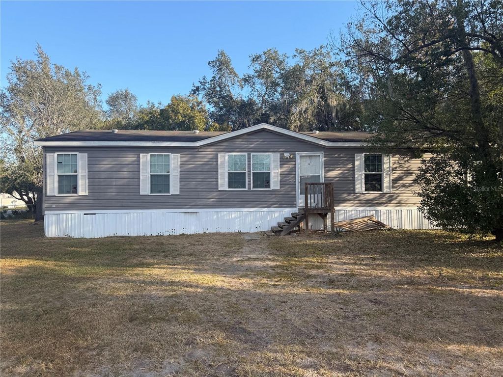 Photo of 6412 Old Lake Wilson Road, Davenport, FL 33896 (MLS # P4937109)