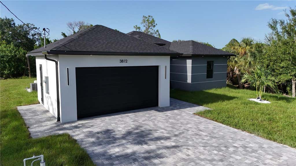 Photo of 3812 11th Street SW, Lehigh Acres, FL 33976 (MLS # TB8541020)