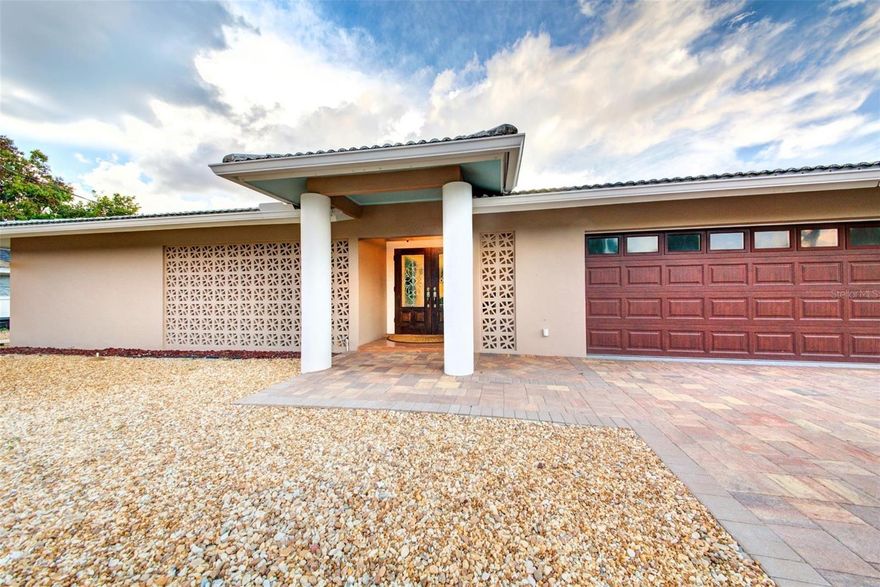 Available on an Annual Lease. This is a nicely furnished 3 bedroom 2 bath Grand Canal pool home with a deep-water dock on Siesta Key! The home has a foyer entry with etched glass front doors. The open concept floor plan includes living, dining and family rooms which feature pocketing sliding glass doors leading to the large, screened-in lanai, paver deck and sparkling free-form pool overlooking the waterway. The remodeled kitchen features an oversized island with seating for six, wood cabinets, granite countertops, a five-burner gas cooktop, stainless steel appliances and abundant storage. The waterfront master-bedroom features direct access to the pool and has views of the Grand Canal. The master bathroom has a walk-in closet and private toilet / shower room with a tub/shower combination. There are two additional bedrooms and a full bath. The laundry room has additional storage and is located near the kitchen and two car garage. The screened in patio has a pool and view of the canal. The zero-scaped yard is maintenance free. You are able to fish, kayak, paddleboard or boat from the dock in your own backyard. Located in the waterfront community of Siesta Isles, near the powdery white sands of world-famous Siesta Beach and near Siesta Village's charming shops and restaurants. Amenities include, lawn care and pool care. There is a propane tank for the gas stove that is full, however the tenant is responsible to refill it when depleted and at the end of the tenancy. We score every application. If an application doesn’t score high enough, the resident may be required to place the equivalent of two months’ rent in a security deposit. Please be aware that leasing this property includes a non-optional Home Assistant Services Package that will cost an additional $39 per month. These services and their cost are separate from Tenant’s monthly rent payment and all other payments described in the Lease or any separate Lease addendums. The Home Assistant Services offered are described in the Resident Welcome Packet which can be viewed on our website at Sarasota Management & Leasing.