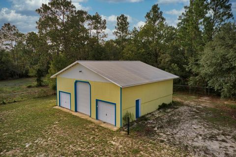 Tiny photo for 23061 SW Nautilus Boulevard, Dunnellon, FL 34431 (MLS # OM708151)