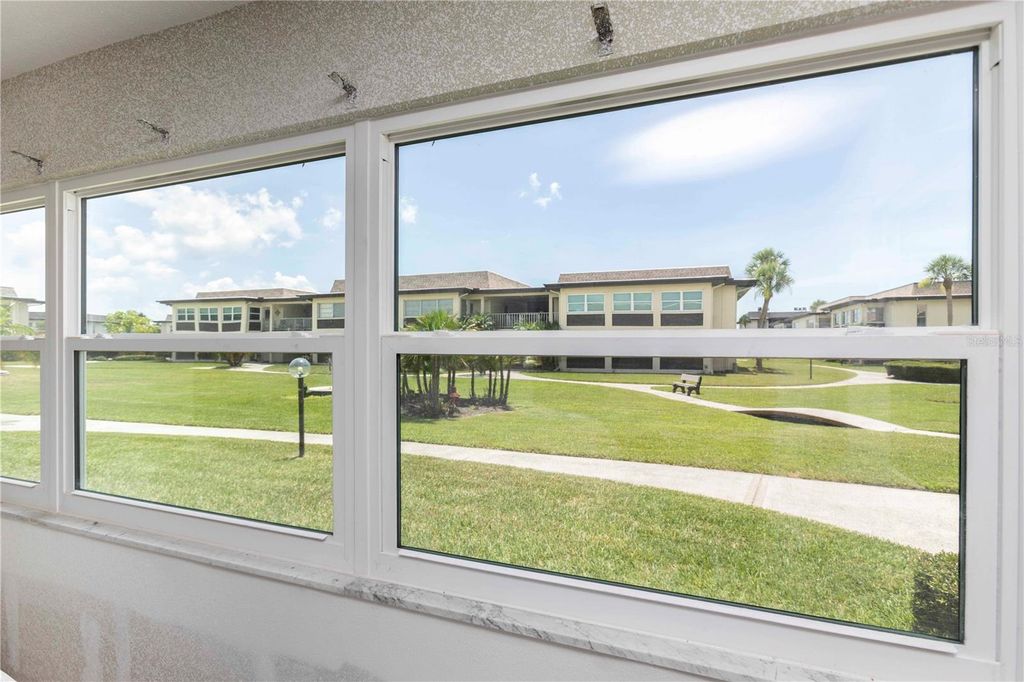 Photo of 4754 Marine Parkway #103, New Port Richey, FL 34652 (MLS # W7876431)