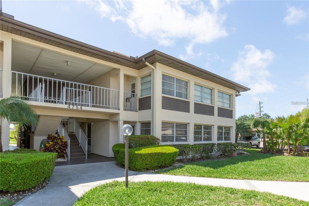 Photo of 4754 Marine Parkway #103, New Port Richey, FL 34652 (MLS # W7876431)