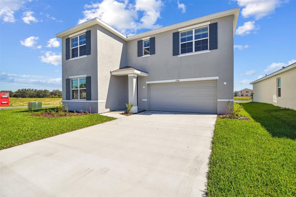 Photo of 2774 Common Fig Run, Wesley Chapel, FL 33543 (MLS # TB8442206)