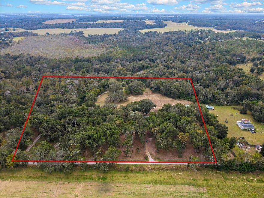 Discover the perfect blend of country living and practical functionality on this beautiful 10 acre property. Surrounded by open skies and natural beauty. This property offers endless potential for farming and creating your own private homestead. The property also includes a spacious double wide manufactured home. Offering a light and bright interior. Large living space with amble room to spread out! Call today to view as this property is priced to sell!