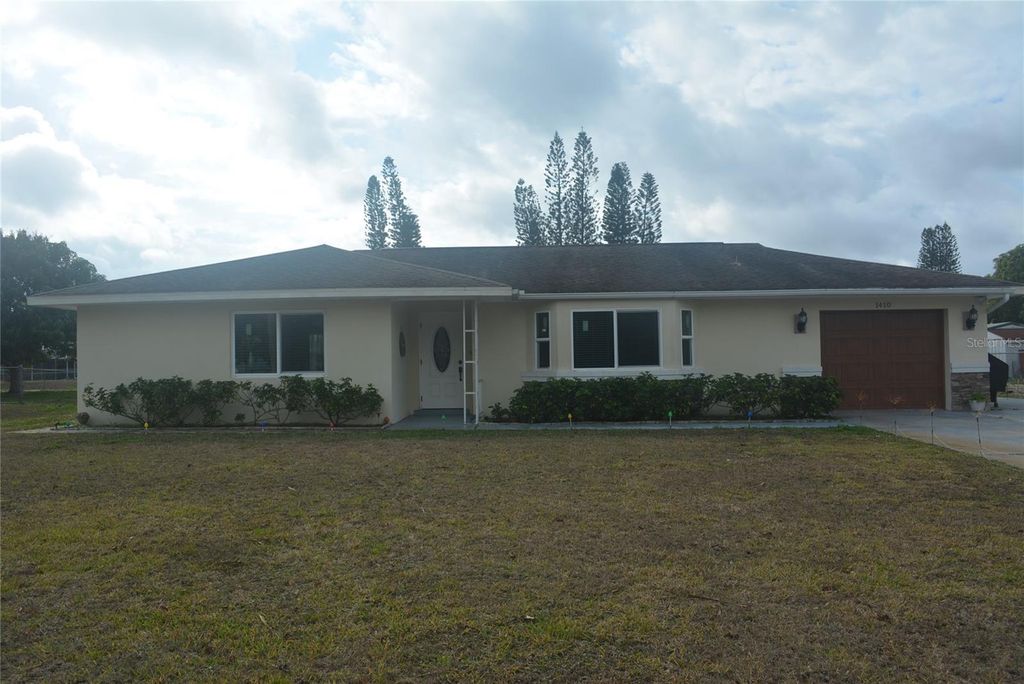 Photo of 1410 Alwynne Drive, Lehigh Acres, FL 33936 (MLS # A4679942)