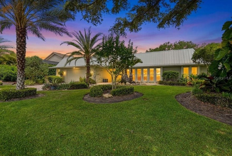 Welcome to this simply stunning, meticulously maintained 5-bedroom, 3-bath residence located in the highly sought-after Southbay Yacht & Racquet Club. Proudly offered by the original owner, this exceptional home showcases true pride of ownership throughout.

Situated on a beautifully treed and lushly landscaped lot, the property offers privacy, elegance, and outstanding outdoor living. The sparkling inground pool and brand-new 2025 pool cage create the perfect setting for entertaining or relaxing in your own tropical retreat. The expansive lanai features gorgeous 24x24 pavers and enhanced outdoor electrical lighting for unforgettable evenings outdoors.

Inside, the home has been thoughtfully updated with a beautifully renovated kitchen with custom tile work, double ovens, quartz countertops.  All that bathrooms have been updated also. Hurricane-impact windows and doors have all been replaced, providing peace of mind and energy efficiency. Additional upgrades include new flooring, a new roof in 2025, updated house wiring and electrical service panel in 2019, and a complete camera security system.

A unique bonus feature is the fully equipped caterer’s kitchen located in the garage — ideal for entertaining, large gatherings, or serious cooking enthusiasts.

This home combines timeless care, extensive updates, and resort-style living in one of the area's premier boating communities that features tennis courts, clubhouse, pickleball courts, deep water marina, kayak storage and much more!

This is a rare opportunity to own a meticulously maintained and beautifully upgraded home in one of the area’s most desirable waterfront communities.