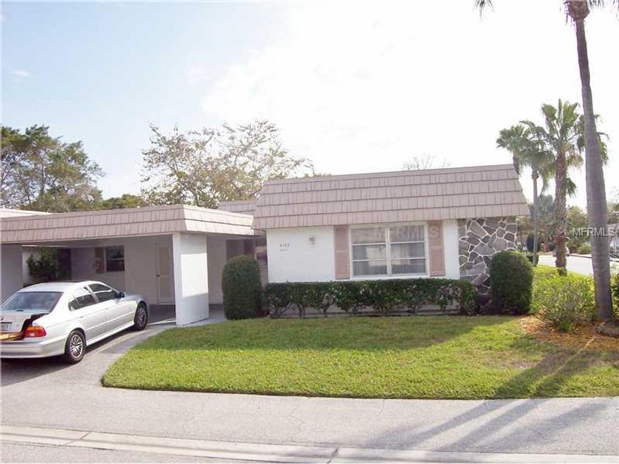 End Unit Villa Priced to sell. New roof 2011. new AC 2012. Most Buyers will choose to re-carpet. All systems function. Wonderful location in complex and in the community. Walk to pool or marina. Close to bus line. Close to shopping, restaurants, medical facilities and world famous Siesta Key Beach. Lots of neighborhood activities. There is a Golf group, many card games on a daily basis and Bingo of course. Many residents go to downtown shows in groups when they have season tickets or just for a show or two. Rent at boat dock for $ 10 per month. 2 small pets ok. Weight does not matter. Must be no taller than 15" from the shoulder.