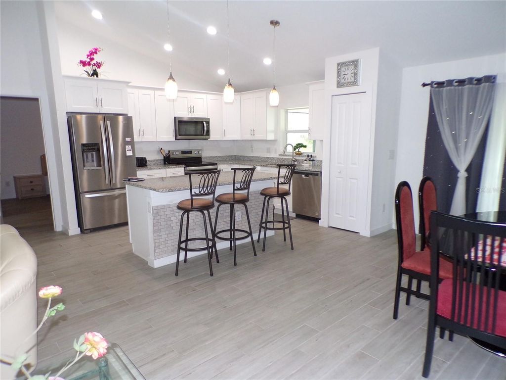 Photo of 334 Millport Street NW, Port Charlotte, FL 33948 (MLS # C7510148)