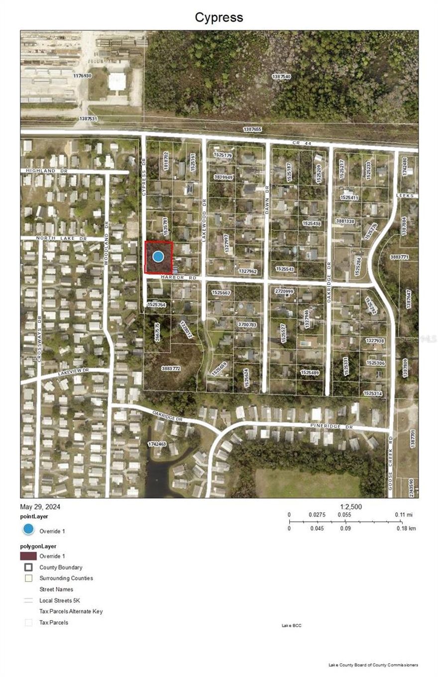Midway between Leesburg and Eustis near Grand Island, this property is perfect for someone looking to build their new home with no HOA restrictions.  Located on the corner of Cypress Drive and Harbor Drive in Haines Creek Heights, this property offers endless possibilities. After consulting with planning and zoning, you could construct a single-family home with an accessory building such as a guest cottage, a manufactured home, or even a tiny home. With the recent changes in Lake County, there is no minimum square footage requirement, providing even more flexibility. You will need to install a well and septic system for your new home. Please contact planning and zoning to confirm that your plans are feasible. Don’t miss out on this unique opportunity to create your ideal living space in a prime location.