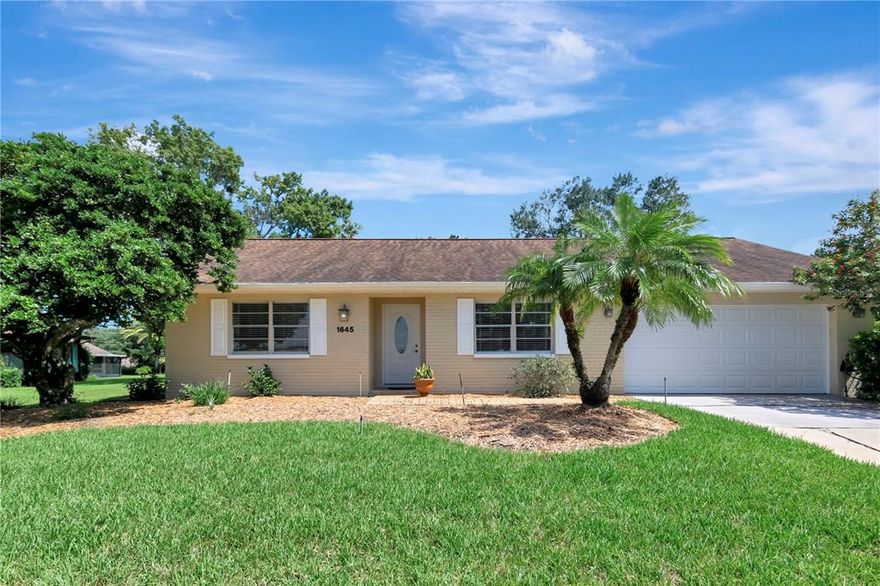 Located in the popular Highland Lakes 55+ Golf Community. 

This move-in-ready home is Clean, Bright & Updated. The Newberry Model Offers an Open Floor Plan: 2 Bedroom/2/Bath/2 Car Garage. The home features a spacious Living/Dining Room Combo w/Cathedral Ceiling and two large Skylights, with an additional Skylight in the guest bath, adding natural lighting to these rooms. The kitchen offers real wood-finish cabinets with stainless steel appliances and granite counter tops. This home also features an additional bonus room, an enclosed porch, most all windows are newer high-impact, and a new Amana washer and newer GE dryer. The paved back patio is ideal for impromptu gatherings and is perfect for those Florida BBQ’s. 
The monthly HOA fee of $109 provides more than one can imagine. The association membership includes almost 100 club benefits and activities, from a fabulous Saturday breakfast and casual parties to large dinner/dances and shows.  Activities also include card and game nights.  The arts and crafts annex invites you to broaden your creative horizons while releasing your creative self. Residents of the community also enjoy unlimited golf on a 27-hole course, tennis, pickleball, bocce, shuffleboard, an Olympic-size “heated” pool and spa, and scenic pontoon boat rides with the resident volunteer captain.   There is also an RV/Boat secured lot parking on Lake Tarpon, with boat access to the lake. Truly, there are far too many activities and social events available to mention. The HOA has even designed a local Highlander newspaper to keep you on track and informed, so you don’t miss a single activity. 
Seller's including a Home Warranty for one full year, this cover AC, Heating, W/H, Fridge, Oven, Washer and Dryer. 
This is the perfect place to live and enjoy all Highlander has to offer.