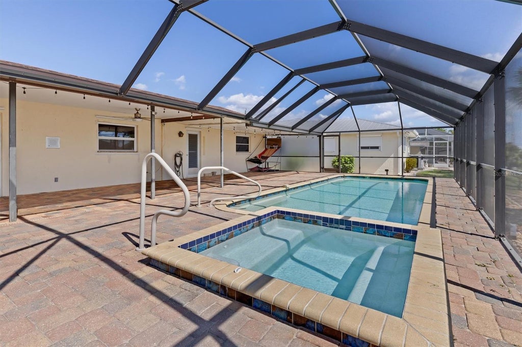 Photo of 109 Peckham Street SE, Port Charlotte, FL 33952 (MLS # C7530639)