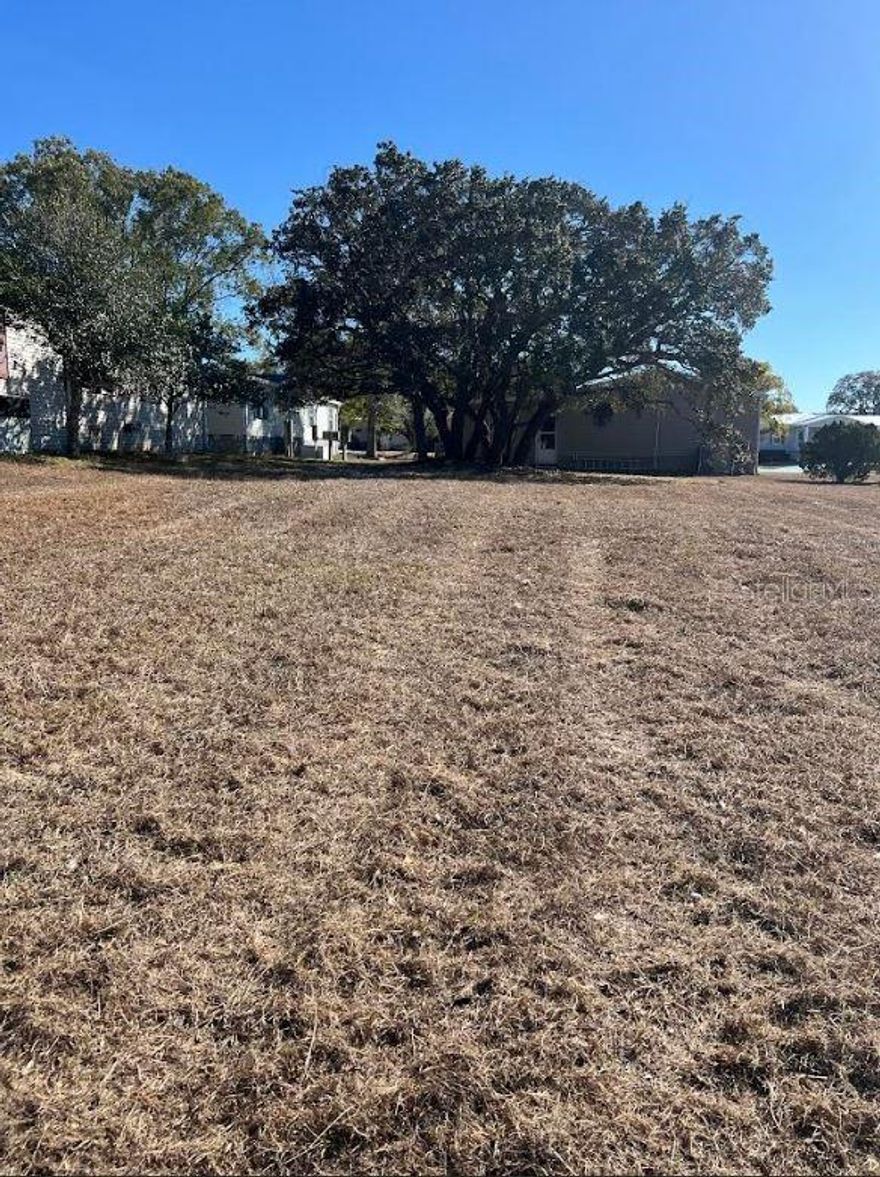 Bring your vision to life on this prime vacant lot located in the highly sought-after, gated 55+ community of Brookridge. Whether you are looking to build your Florida retirement oasis or seeking a savvy investment, this property offers the ultimate flexibility. Nestled on Brookridge Blvd, this lot provides easy access to the community’s premier amenities, including a championship golf course, clubhouse, swimming pool, and social activities. You are minutes away from the Suncoast Parkway, making travel to Tampa, pristine Gulf beaches, and local shopping a breeze. This lot is ready for your brand-new manufactured home. We specialize in manufactured home excellence. Ask about our exclusive dealership opportunities where you can select a high-quality model and coordinate a seamless purchase and installation package directly through us. Or just buy the Lot.