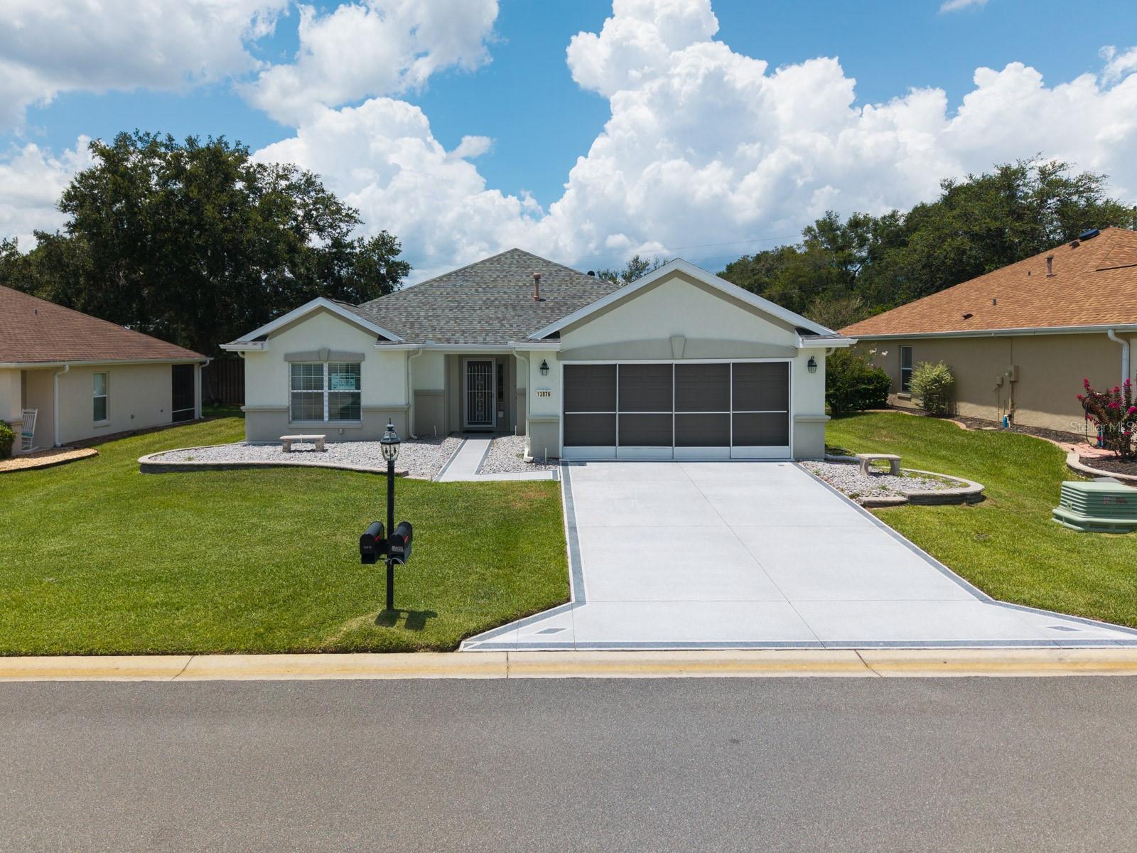 Live like you’re on vacation every day in this premier 55+ gated community. This 2 bedroom 2 Bathroom With Den/Office in Desirable Del Webb Spruce Creek Golf & Country Club. In the Master Bedroom there are double doors going into the ensuite Bath & Walk in Tub. Triple slider leading out to your 28X10 Enclosed Lanai and a screened in Patio. This home also has a Home Generator and comes with its own Golf Cart. A/C was replaced in 2016 and Roof in 2014.
Challenge yourself on 4 unique 9-hole golf courses, tennis, pickleball, shuffleboard, billiards, computer room, indoor and outdoor swimming pools, hot tubs, dog park, and a nature trail. There are more than 70 clubs established in Spruce Creek Community. You will always have something to do, or you can Relax by the indoor or outdoor swimming pools. Endless opportunities to connect and thrive.