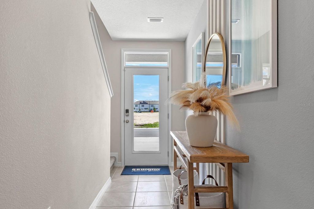 Photo of 1343 Tallowwood Lane, Davenport, FL 33837 (MLS # O6354924)