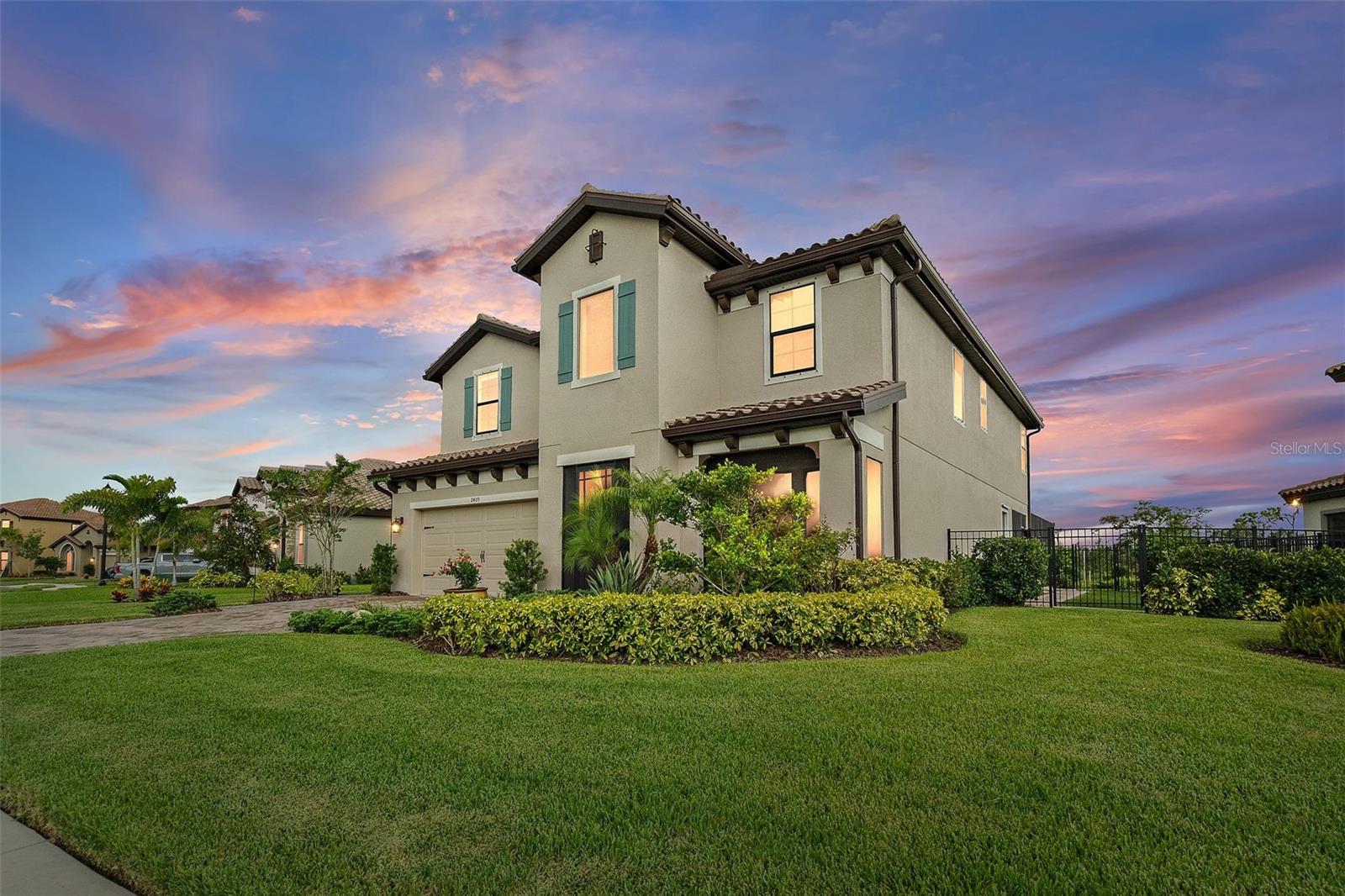 Stunning 2023 Luxury Home with Resort-Style Pool and Conservation Views. Discover unparalleled luxury in this meticulously crafted 5-bedroom, 3-bathroom, 3-car garage home, complete with a dedicated office, expansive bonus room, and nearly 3,400 sq. ft. of living space. Located in the prestigious Crosswind Ranch community, this home offers a perfect blend of elegance, functionality, and modern upgrades. Spacious 5 bedrooms, including a luxurious owner’s retreat with sitting area, oversized walk-in closet, and an elegant ensuite bath featuring a custom vanity, shower enclosure, and separate water closet. The open-concept design includes a grand living room, dining area, and an incredible island kitchen, all with seamless access to the outdoor lanai. Beautiful Ventura Sand wood tile flooring (7"x22") graces the main living areas, adding warmth and sophistication. Gourmet kitchen boasting Kinsdale Maple Slate cabinets with crown molding, Snow Flurry Quartz countertops, subway tile backsplash, undermount lighting, gas range, walk-in pantry, and premium appliances. Custom landscaping, fencing, paver installations, screen enclosures, updated lighting, custom trim, cellular shades, vertiglide shade, and ceiling fans throughout. The crown jewel of this property is the recently completed (2024) custom swimming pool and Jacuzzi. Surrounded by an oversized lanai and overlooking serene conservation views, it’s the ideal space for entertaining or relaxing while soaking in breathtaking Florida sunsets. Additional highlights include 3-car garage with ample storage, front porch overlooking a tranquil pond and lower-level guest suite with pool access. Perfectly situated, Crosswind Ranch offers easy access to major hubs: 30 minutes to downtown St. Petersburg and Sarasota, 40 minutes to downtown Tampa. Exclusive community amenities currently available, include a pool, cabana, pocket parks, and scenic pond views. Future amenities coming soon to Crosswind Ranch to include Pickleball, Dog Park and more. This home is a testament to pride of ownership and offers the ultimate in luxury living. Don’t miss your chance to own this spectacular property in the heart of Parrish!