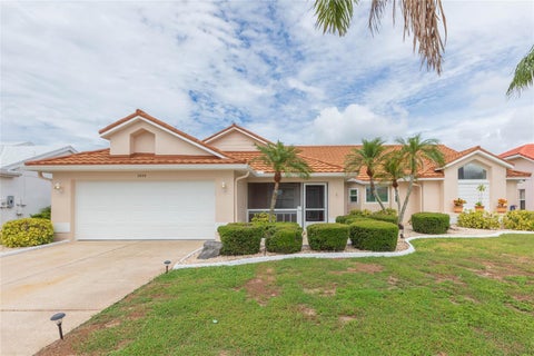 Photo of 2009 New Bedford Drive, Sun City Center, FL 33573 (MLS # TB8547030)