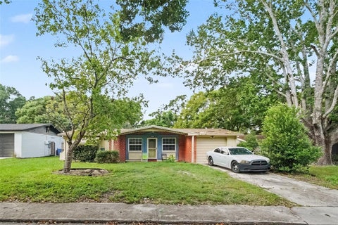 Photo of 6249 Maplewood Drive, New Port Richey, FL 34653 (MLS # TB8549976)