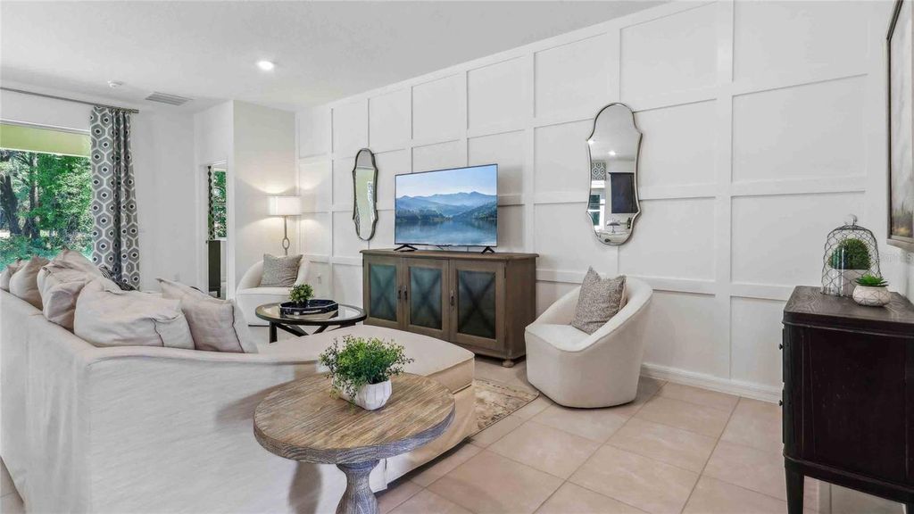 Photo of 8210 Ives Place, Wildwood, FL 34785 (MLS # OM716343)