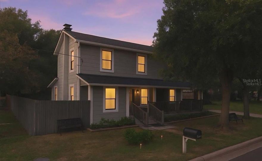 Beautifully update and renovated home with so much history and charm. This home has 3 bedrooms and 2 bathrooms. The gorgeous kitchen has stainless steel appliances, granite counters tops and updated cabinets.  There is a wood burning fire place that invites you to get comfortable and cozy by in the living room.  The primary bedroom and laundry room are conveniently located down stairs.  You can enjoy your days and/or nights on the covered porch. The home has new roof (2021), new hot water heater and A/C (2024), updated windows and MUCH MORE.  The back yard is fenced with a parking space for a RV with full hook ups. Great property for rental, short term rental, or full time living.  This home has the old Florida charm and a must see property!!!