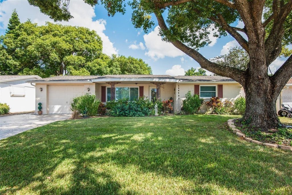 Photo of 3802 Mynabird Drive, New Port Richey, FL 34652 (MLS # TB8489631)