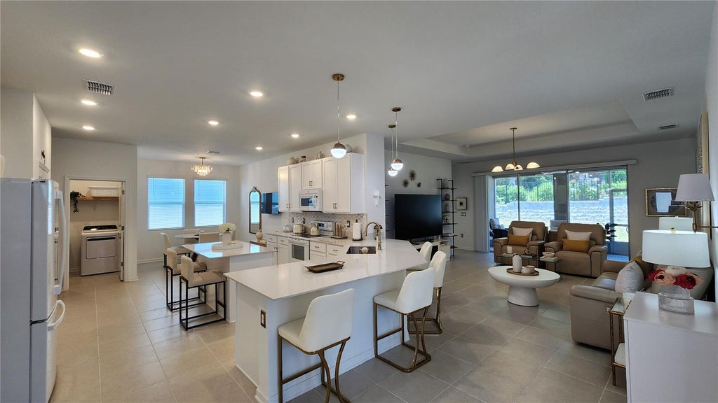 Photo of 2095 Rider Rain Lane, Apopka, FL 32703 (MLS # O6416804)