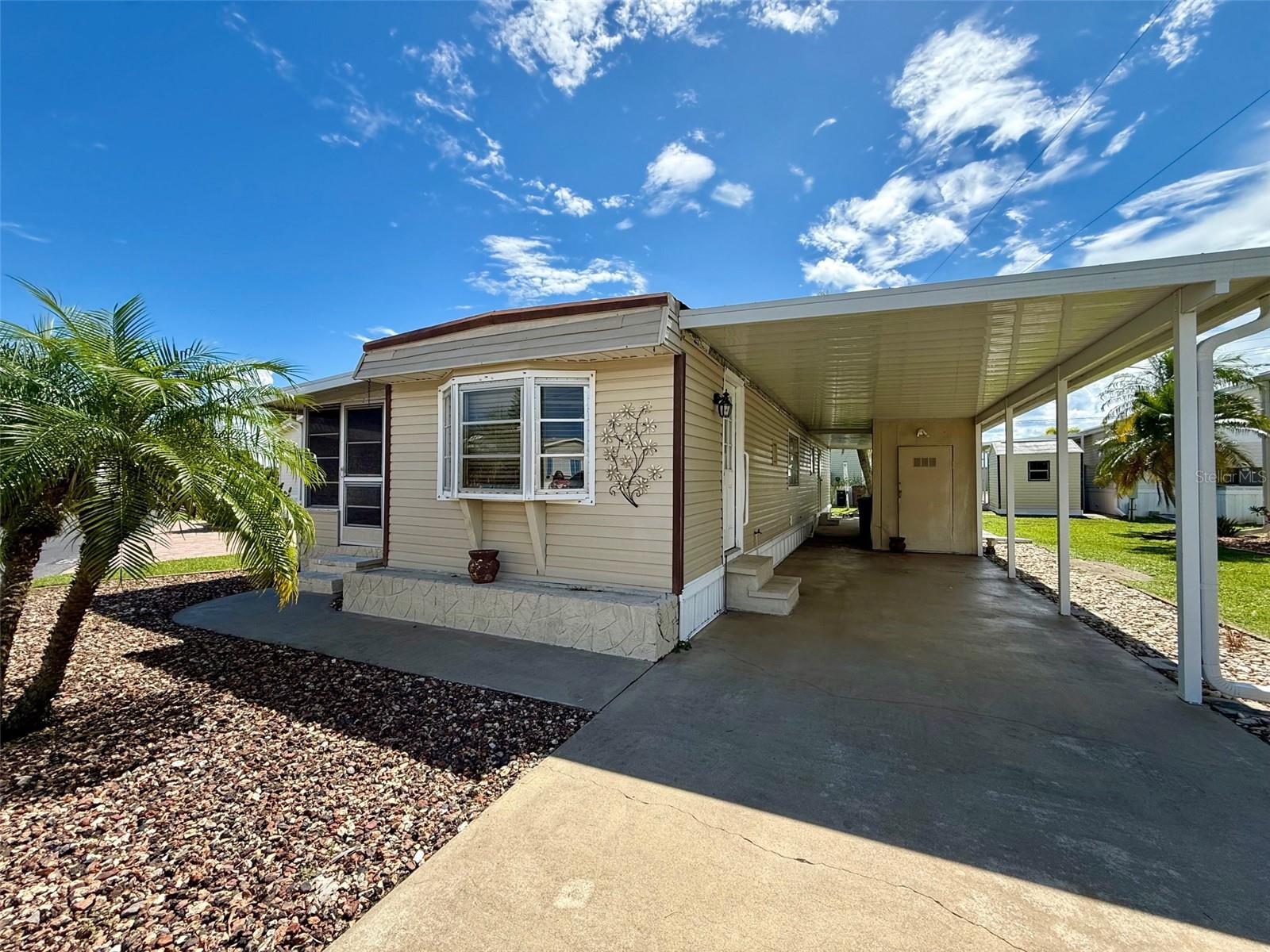 Fixer-Upper in the popular River Haven community ready for you to unleash its potential. Nestled within one of Punta Gorda's most sought-after 55+ communities, this hidden gem invites you to tap into its incredible potential and turn it into your dream sanctuary. 2 bedrooms with 1 full bathroom and just waiting for your personal touch. Imagine transforming the layout into an open-concept area with inviting space perfect for entertaining friends and family. Location is key, and this property truly excels! Positioned just moments away from everyday conveniences like Publix grocery store, Walmart for those quick shopping runs, and Home Depot for all your DIY projects – everything you'll require is within easy reach. Enjoy leisurely weekends exploring the vibrant local community in downtown Punta Gorda with fine and casual dining, boutique shopping and weekly farmer's markets or take advantage of nearby parks and waterfront activities that Punta Gorda on Charlotte Harbor has to offer! Whether you're looking to invest in a promising opportunity or craft a residence uniquely yours this is it! Call today for a private showing.