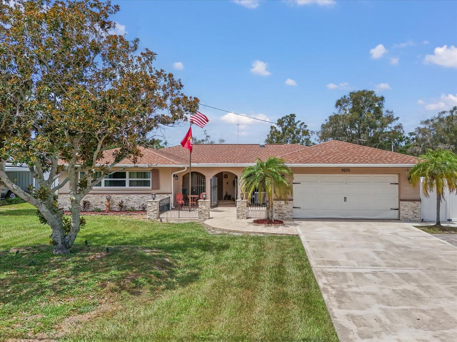 Welcome to Yacht Club Estates, a Beautiful Oasis Resort style 3-bedroom, 2-bath pool/ spa home. This home is only a few miles to the Gulf Beaches & sits on a large spacious lot, with a park view. The ambiance is very inviting as you step inside. Property Highlights: 1902 square feet of heated living space that spreads across a split floor plan; with an open kitchen, dining and family room that provides the perfect setting, all while overlooking the generous sized solar heated saltwater pool and spa. (13’x32’). The brand new Panoramic Screen provides a spectacular view. The kitchen is stylish and functional, with Stainless Steel appliances, Granite countertops, solar tube Skylight which provides beautiful natural lighting, plenty of eat in space, and a new ceiling fan. The spacious family room has an electric fireplace and large sliding doors that open up for gatherings and entertainment, giving the perfect relaxed setting.
The Master en-suite features crown molding, a brand new Ceiling fan, windows offering plenty of natural lighting. The en-suite provides dual sinks, a walk in closet and plenty of cabinet space. The split plan provides two large guest rooms and a pleasingly updated guest bathroom.
The home features wood looking and ceramic tile throughout the home. This home is a smart home with smart lighting. Ceiling fans are new in all the rooms. The AC (2024), Home has a Whole house WATER FILTRATION SYSTEM, Water softener, Brand new pavers, extended parking pad. The extra features are Welcoming to boaters, Rv or any use that fits your needs. This home also provides a Carrier Whole House GENERATOR, (2) 120 gallon propane tanks, mature landscaping, BRAND NEW vinyl fencing for your privacy. The pool pump is multi speed (2023), New gutters, New French Drainage, New Retaining wall, New Epoxy in the Large Garage. No HOA, centrally located with easy access to the beaches, Lake Seminole Park, Shopping, Dining, Excellent schools. This home is not in a flood zone.Measurements are aprox.
