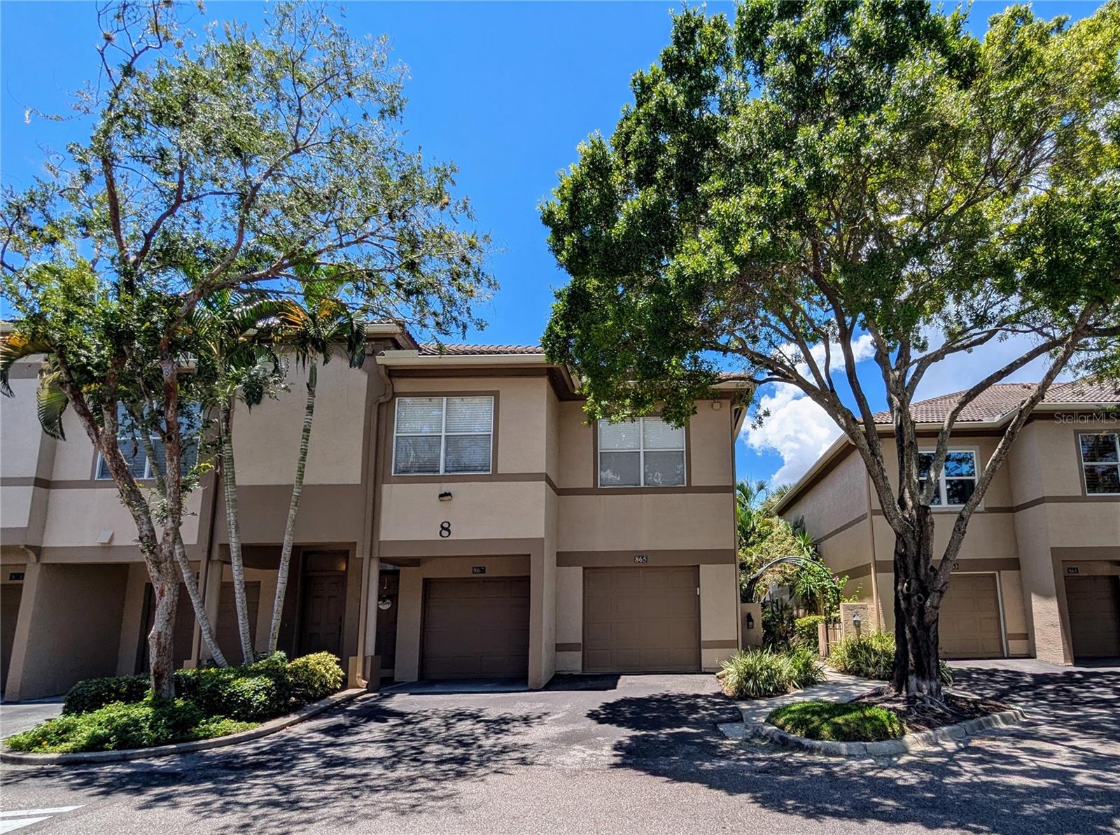 Discover urban luxury in this beautifully updated 3 bedroom, 2 bath condo located in the heart of Harbour Island, just moments away from downtown Tampa's vibrant attractions and waterfront views. This meticulously maintained end-unit residence features tile flooring in wet areas and elegant wood floors in hallways and bedrooms, ensuring comfort and easy maintenance throughout. The kitchen boasts recent upgrades including a brand-new dishwasher, double door fridge with ice maker, and a spacious sink, perfect for culinary enthusiasts. The guest bathroom has been remodeled with a luxurious soaker tub, frameless shower door on hinges, and a new AC unit for added comfort. Additional highlights include a laundry room with stackable washer and dryer and extra pantry shelves, providing convenience and ample storage space. The garage features epoxy flooring, suspended ceiling storage, this home also has retractable screen door leading to the patio, enhancing both functionality and outdoor enjoyment. Residents will also enjoy access to community amenities such as a pool, fitness center, and clubhouse. With its prime location offering easy access to downtowns finest dining, shopping, and entertainment options, this pet-friendly condo presents a rare opportunity for upscale urban living in Harbour Island. Schedule your private tour today to experience the luxury of downtown living!